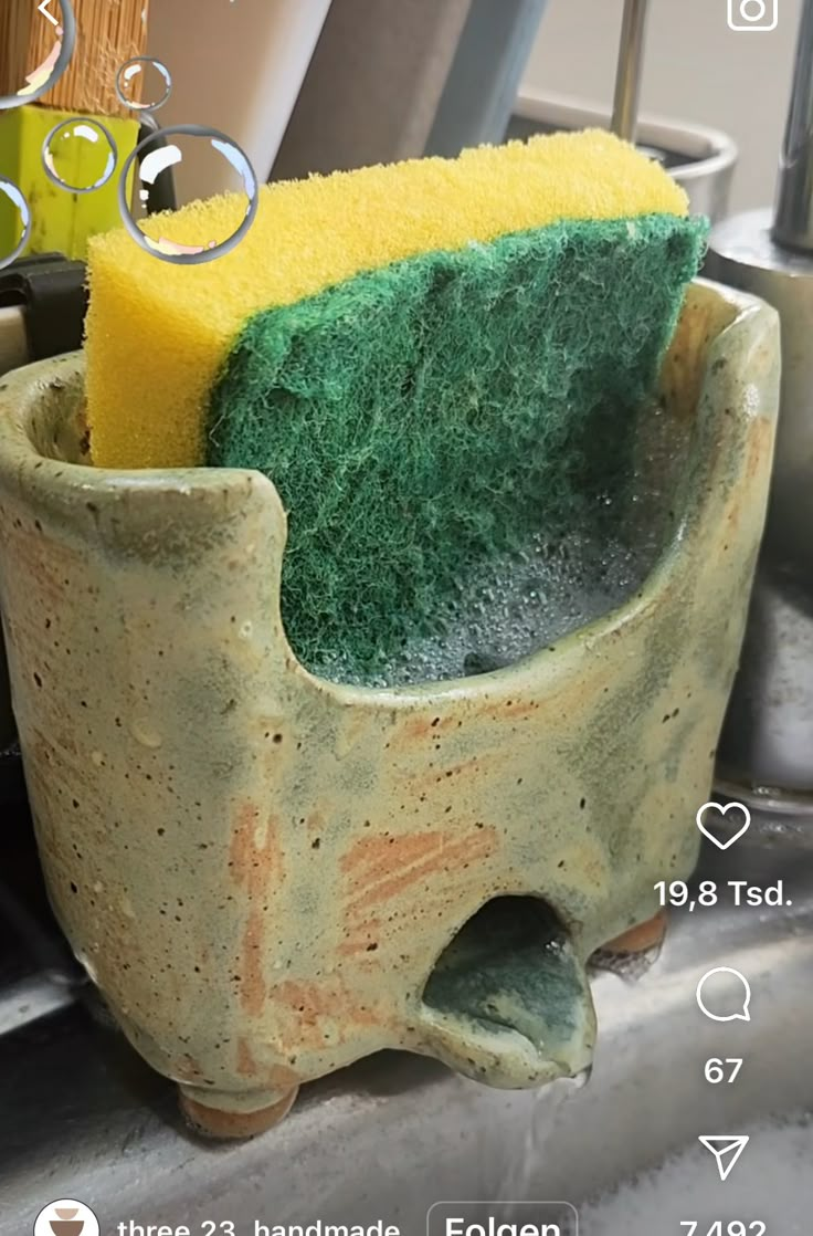 a close up of a sponge in a cup