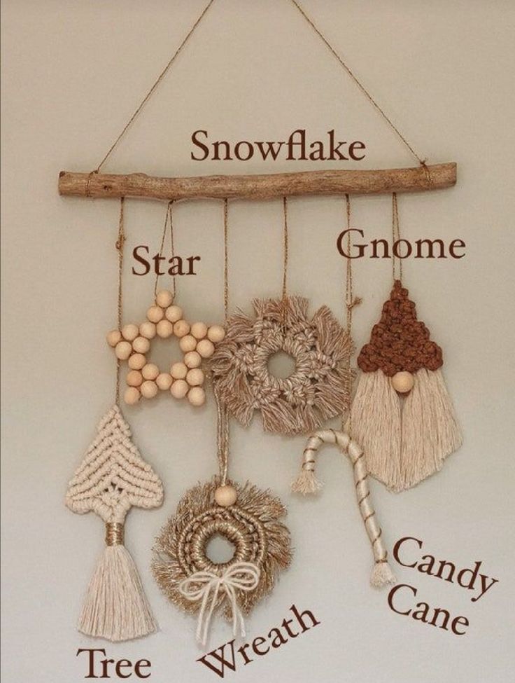 a wooden sign that says snowflake, star, gnome, candy cane, and tree