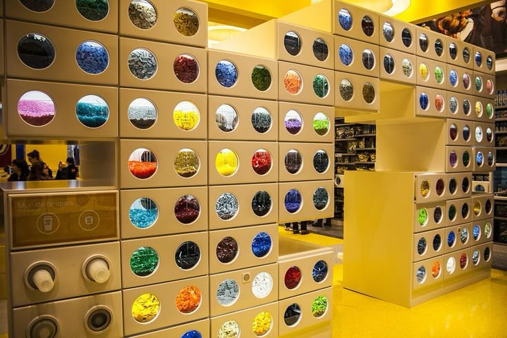 there are many different items on display in the store's wall - to - wall display