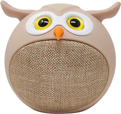 an owl shaped speaker with yellow eyes