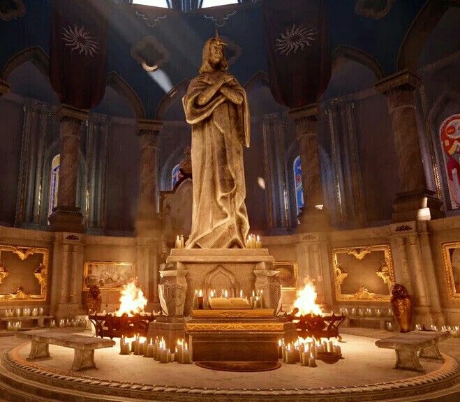 a large statue in the middle of a room with many candles around it and lights on