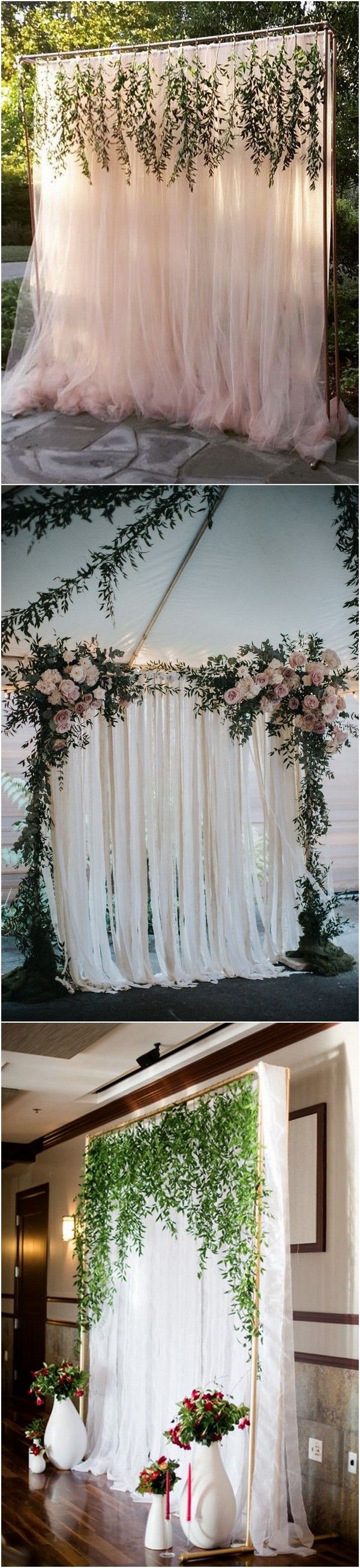 the wedding stage is decorated with flowers and greenery