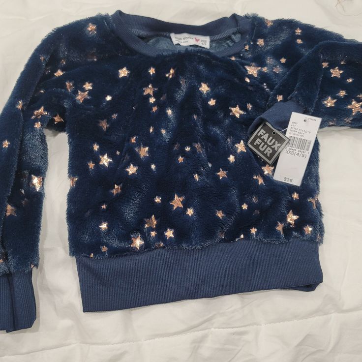 Kids Size 4/5 Sweater New And Never Worn. Midnight Blue With Bronze Stars All Over Blue Winter Sweatshirt For Playwear, Blue Winter Sweatshirt For Playtime, Blue Long Sleeve Sweater For Playtime, Blue Crew Neck Sweatshirt For Playwear, Blue Long Sleeve Sweatshirt For Play, Cute Blue Winter Top, Blue Winter Playwear Tops, Blue Winter Tops For Playwear, Blue Tops For Playwear In Winter