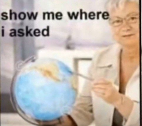 an older woman holding up a globe with the words show me where i asked