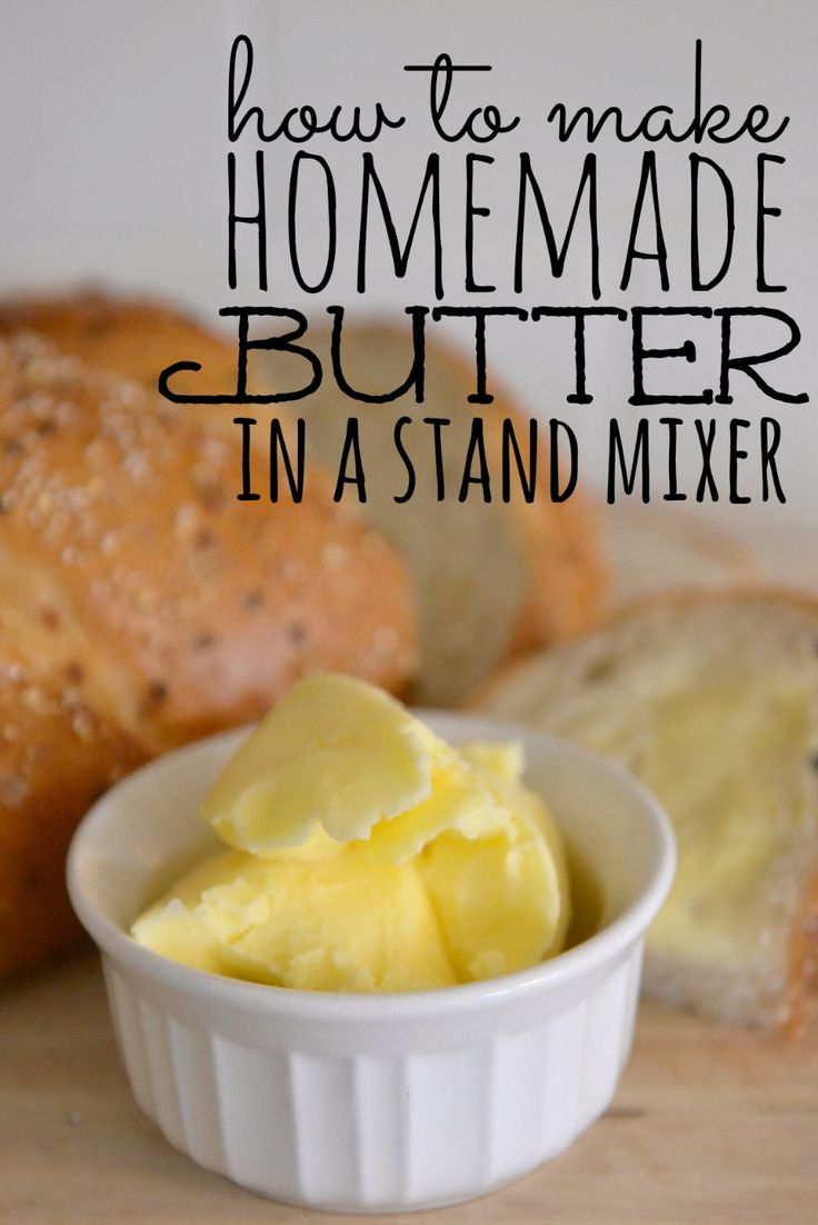 homemade butter in a small white bowl next to bread