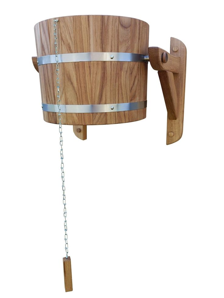 a wooden barrel with chains hanging from it