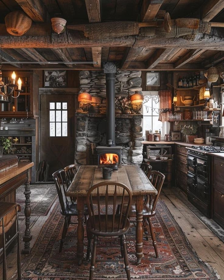 a rustic kitchen with an old fashioned stove and dining room table in the foreground