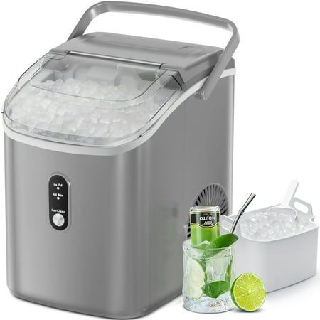 an ice maker with two glasses and limes next to it on a white background