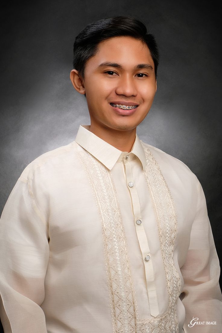 a man in a white shirt and tie