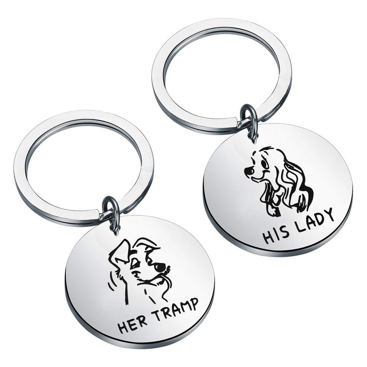 two metal key chains with the words her tramp and his lady on them