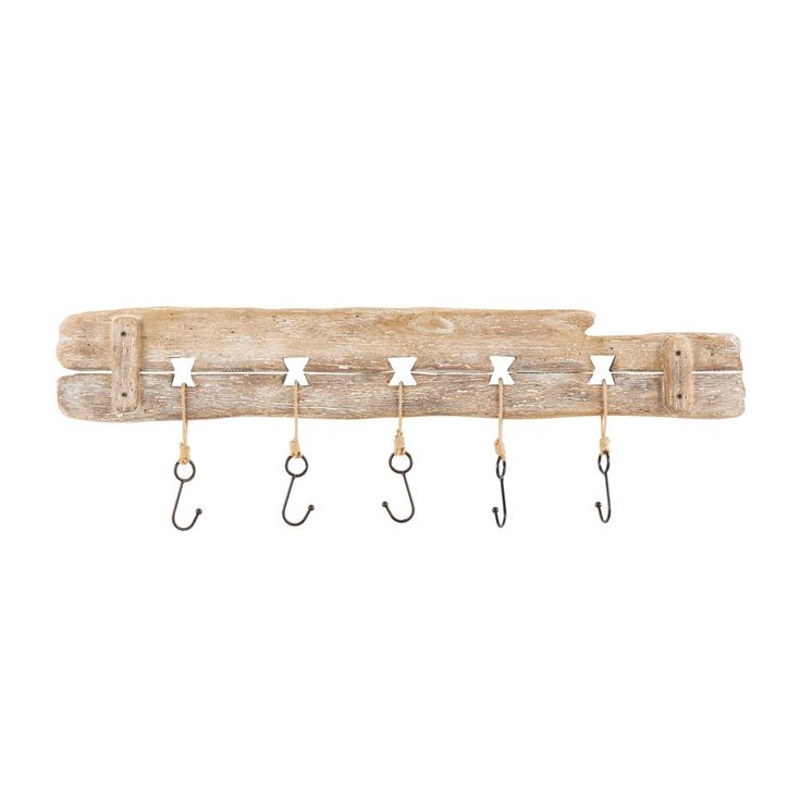 a wooden hook with five hooks hanging from it's end and four stars on each hook