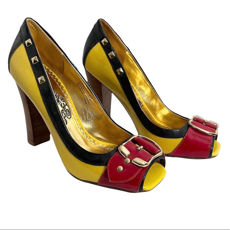 New Without Tags! Never Worn. This Boxy Open Toe Pump From Naughty Monkey Has So Much Edge And Attitude, This Studded Leather Pump Has An Oversized Buckle Detail, Chunky Stacked Heel, And Squared Off Open Toe. With All Of These Bold Details, Your Comfort Will Still Be Number One Thanks To The Cushioned Insole And Smooth Linings. Yellow, Blue, And Red. Size 7. 4” Heel. A Few Small Scuffs As Pictured. Monkey Shoes, Vintage Fashion 1950s, Yellow Heels, Fashion 1950s, Studded Leather, Leather Pumps, Stacked Heel, Yellow Blue, High Boots