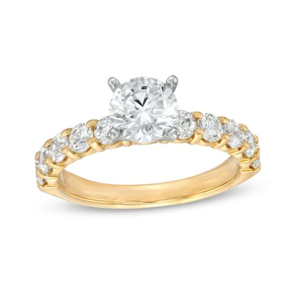 A stunning classic, this diamond engagement ring defines romantic expression. Crafted in 14K gold, this design features a 1 ct. diamond sparkling in a tall setting atop a row of 1/10 ct. diamonds. Captivating with 2 cts. t.w. of diamonds and a bright polished shine, this engagement ring complements her unique style - today and always. Yellow Gold Brilliant Cut Diamond Ring For Valentine's Day, Macy's Yellow Gold Diamond Ring Vvs Clarity, Zales Engagement Rings Yellow Gold, Valentine's Day Hallmarked Yellow Gold Diamond Ring, Heart Shaped Diamond Engagement Ring Zales, Zales Rings, Diamond Engagement Ring Set, 14k Gold Ring, Diamond Stone