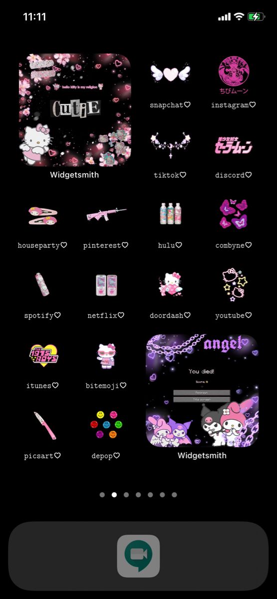 an iphone screen with some stickers on the back and pink, purple, and black background