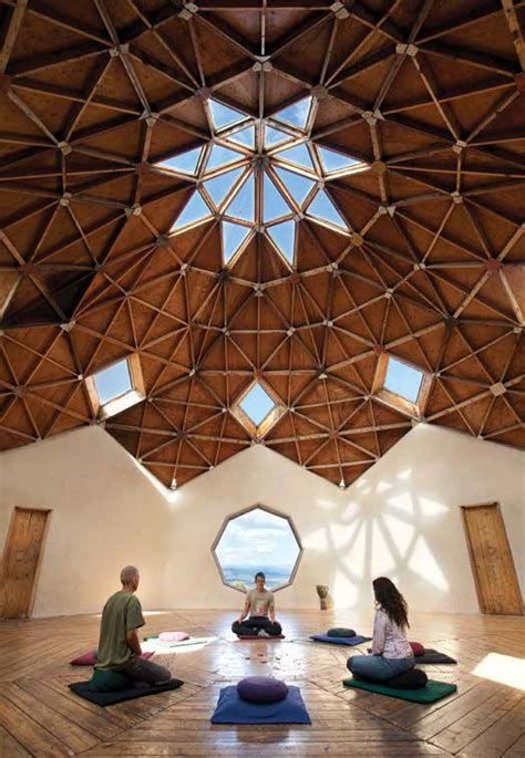 a group of people sitting on top of yoga mats