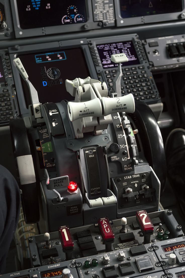 the inside of an airplane cockpit with buttons and controls