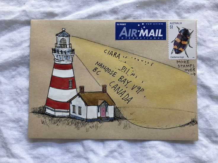 an airmail envelope with a drawing of a lighthouse