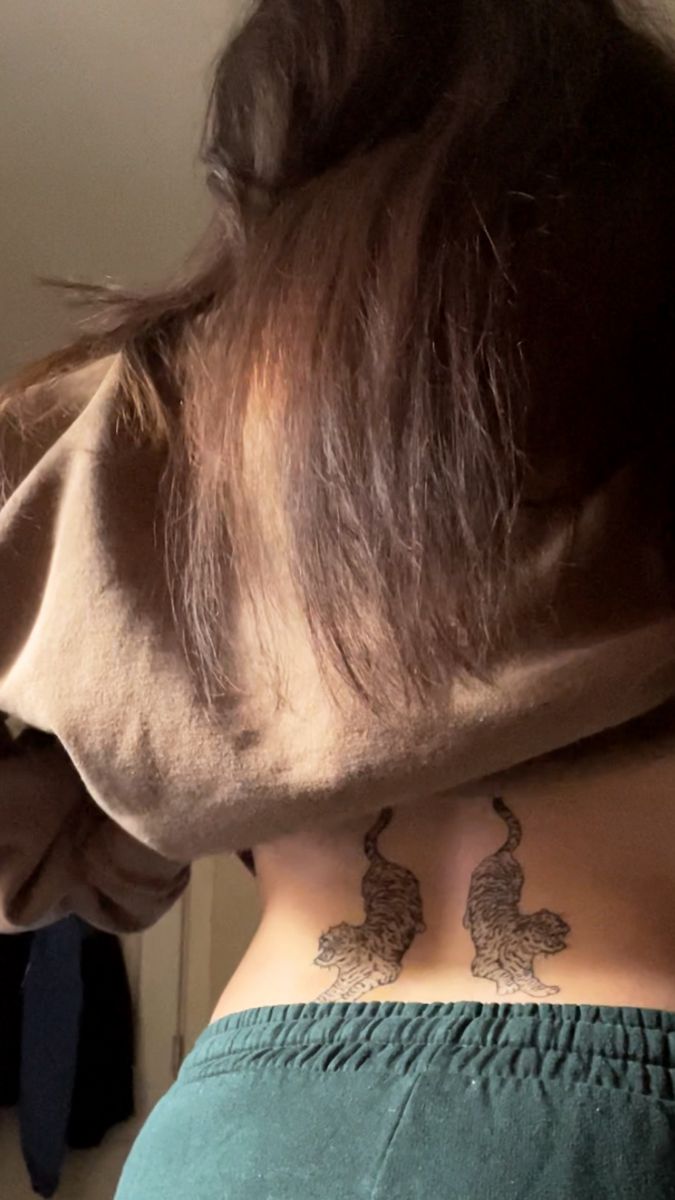 a person with a tattoo on their back