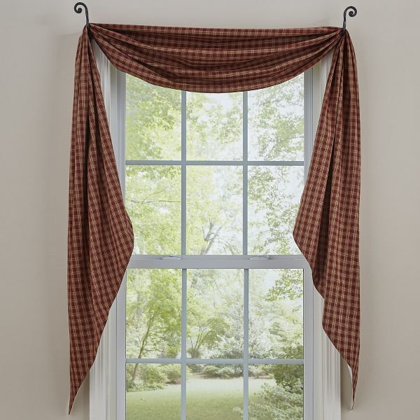 a window with a checkered curtain hanging over it