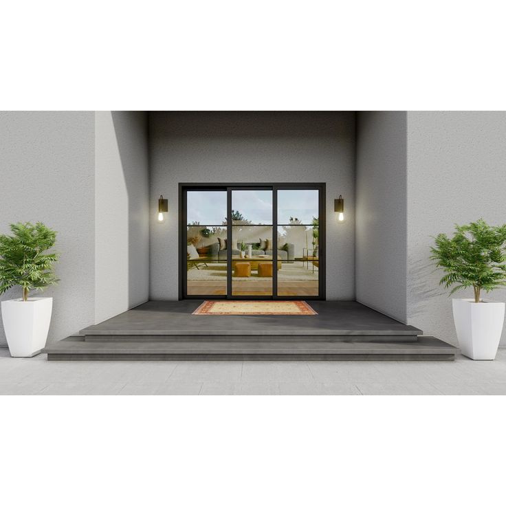 the front entrance to a house with two potted plants on either side of it