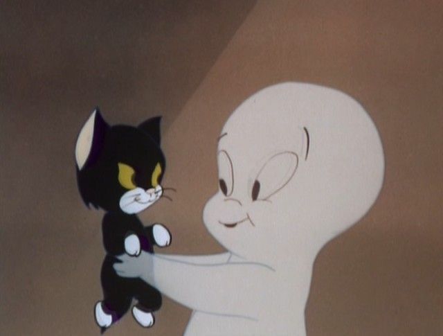 a cartoon character holding onto a black and white cat