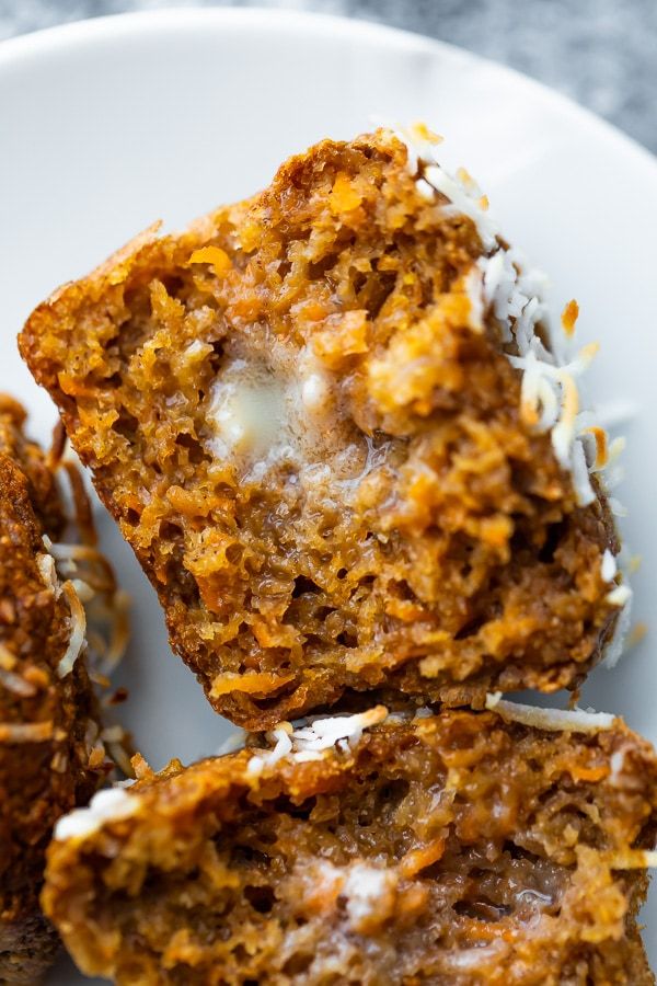 carrot lentil protein muffins on a white plate with text overlay that says carrot lentil protein muffins