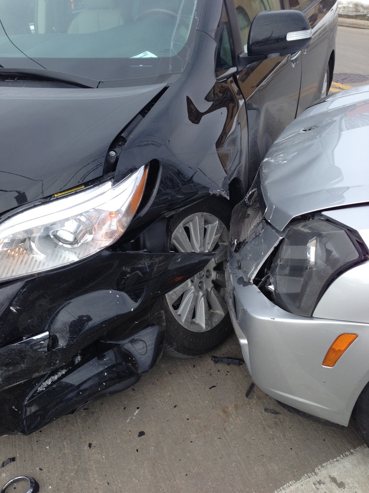 two cars that have been involved in an accident