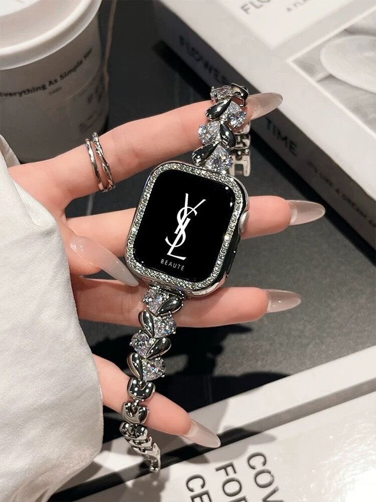 Introducing the Cute Diamond Heart Bracelet iWatch Band! This stunning accessory is designed to elevate your Apple Watch Series 1, 2, 3, 4, 5, 6, 7, 8, 9 Ultra Generation. With its diamond heart design, it adds a touch of elegance and sparkle to your wrist. The adjustable chain ensures a perfect fit for your 38mm, 40mm