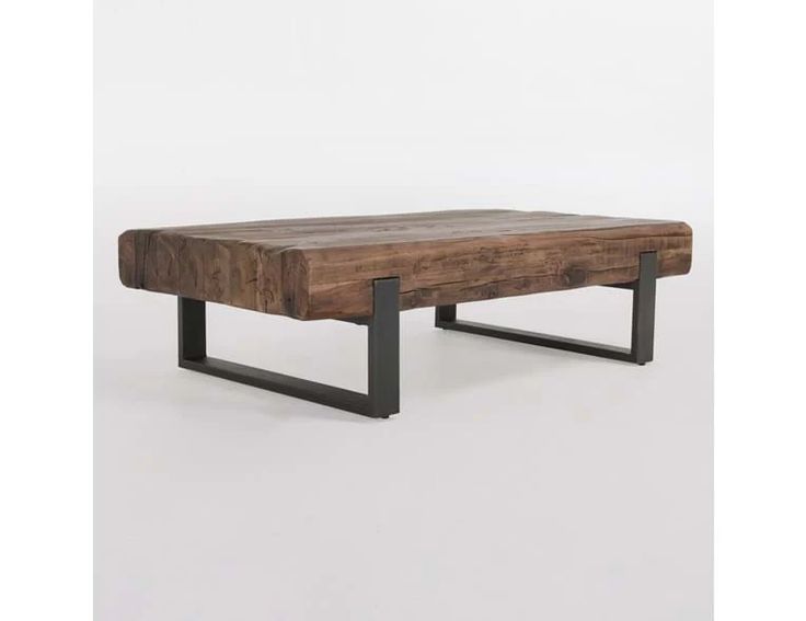 a wooden coffee table with metal legs