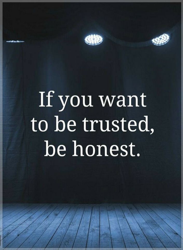 an empty room with three spotlights and a quote on the wall that says if you want to be trusted, be honest