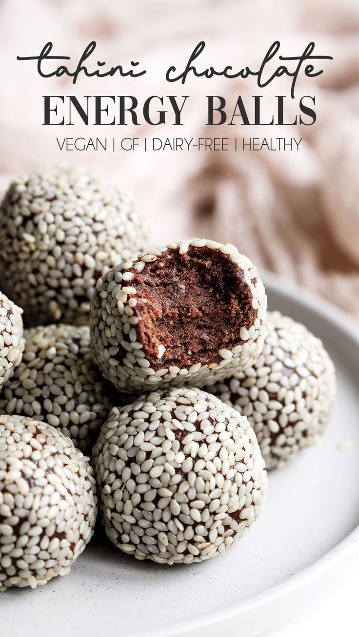 vegan chocolate energy balls stacked on top of each other with the title above it