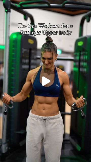 a woman in a blue top and white pants is holding two dumbbells with the words do this workout for a longer upper body