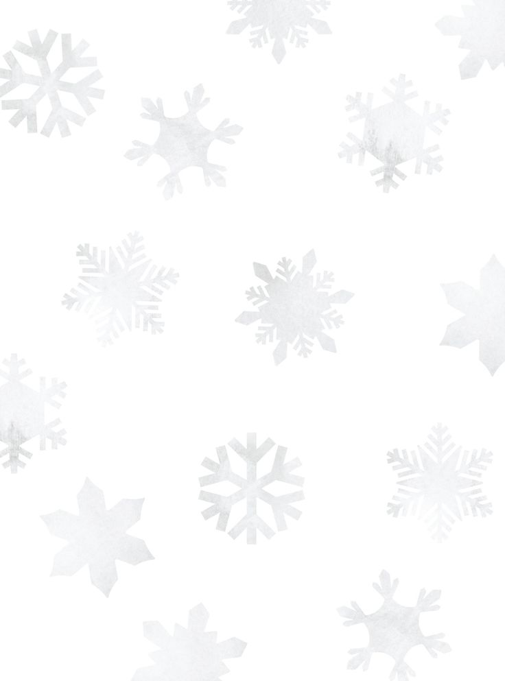 snowflakes are flying in the air on a white background