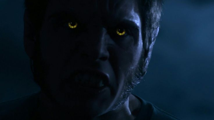 a man with yellow eyes in the dark