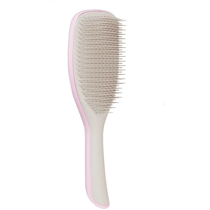 Achieve flowing, tangle-free locks with the Tangle Teezer The Large Wet Detangler Hairbrush in colour ‘Pebble Grey Kiss’. A supersized version of the brand’s ‘The Wet Detangler’, this hairbrush is effective yet gentle on the hair, working to loosen knots and kinks without excessively tugging at your strands.  The brush is ideal for those with thick and curly hair types, formulated with a larger surface area to cover more ground as it glides through your hair with ease. Designed to be used on wet hair, this Tangle Teezer utilises the same teeth technology as the original detangler, while the slender handle gives maximum control while you brush. Tangle Teezer Brush, Knotty Hair, Detangler Brush, Knot Out, Tangle Teezer, Curly Hair Types, Tangled Hair, Best Brushes, Detangling Brush