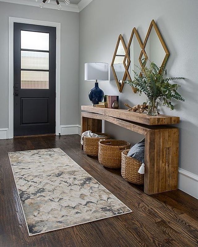 the entryway is clean and ready for guests to use it as a storage area