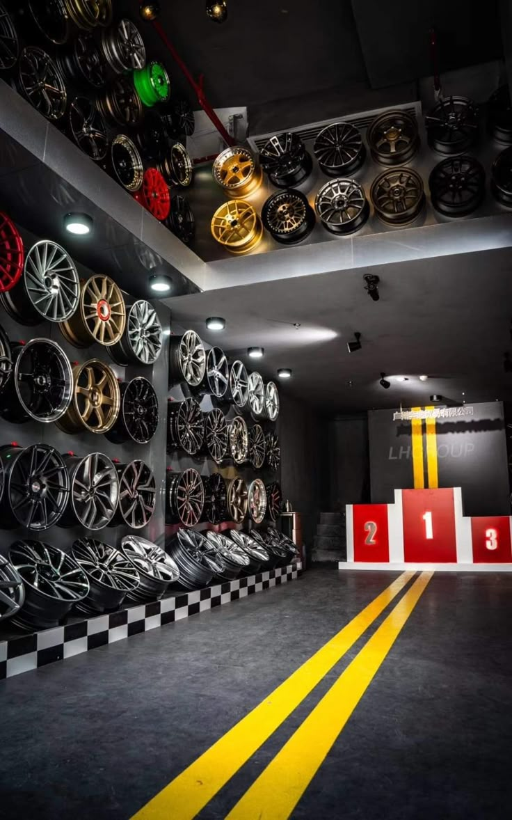 a room filled with lots of different types of rims on the walls and floor