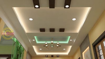 a long hallway with lights on the ceiling and chandelier hanging from the ceiling