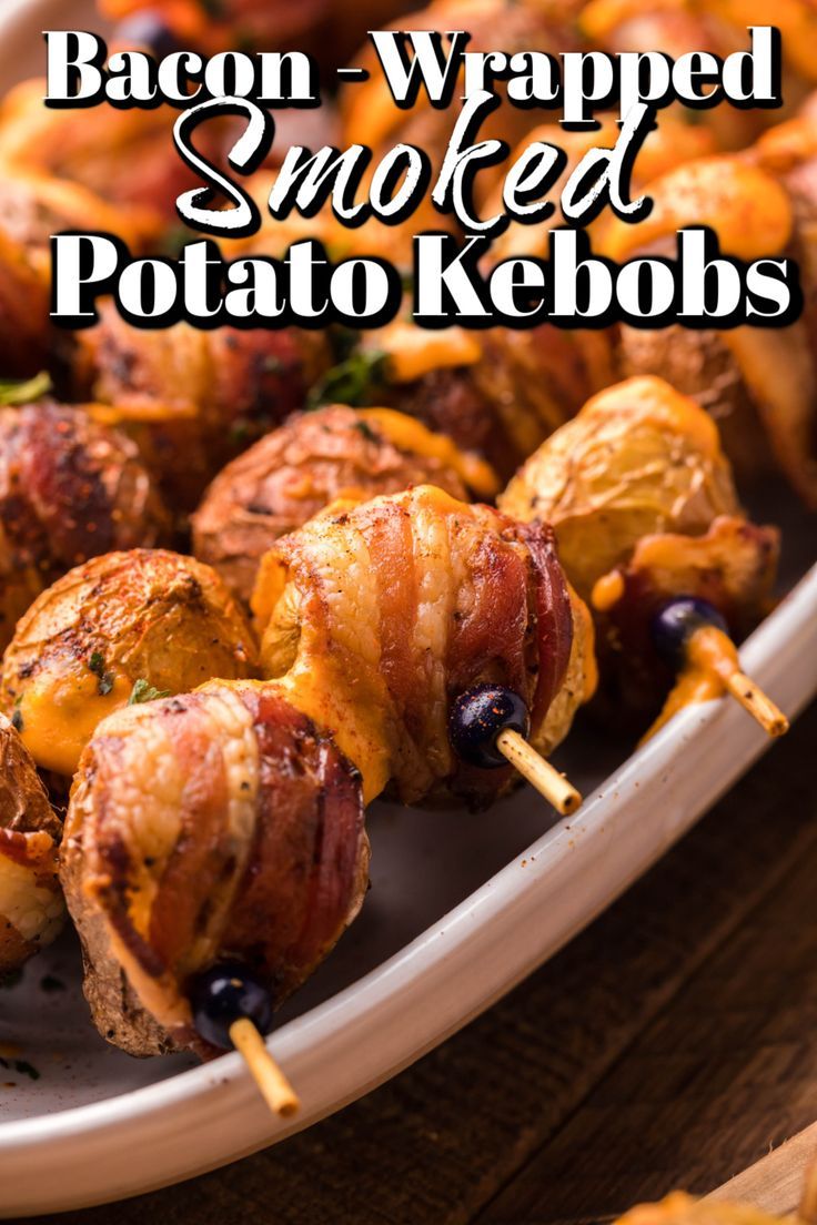 bacon wrapped skewered potato kebobs on a white plate with text overlay