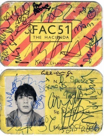 two yellow and black identification cards with autographed people's faces on them