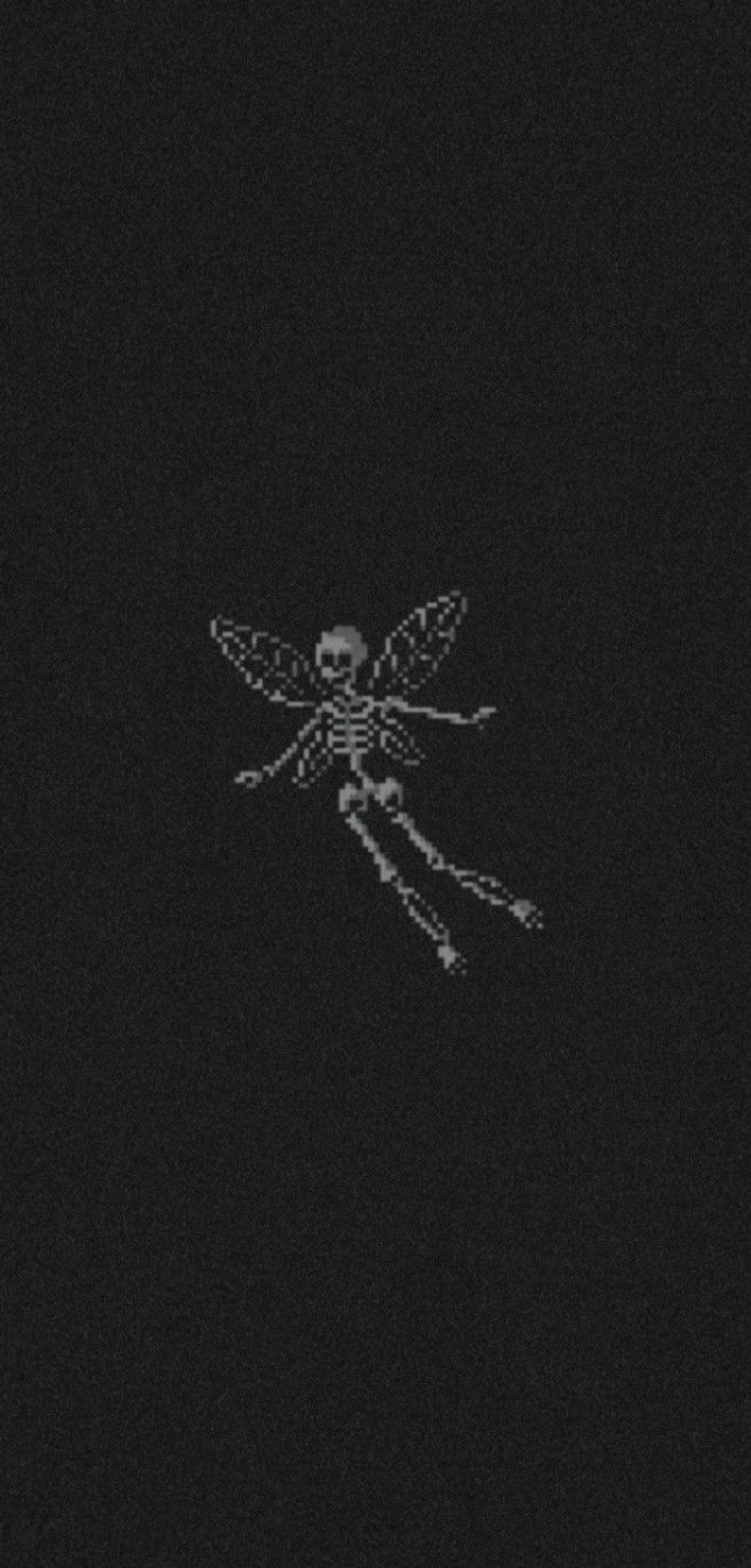 a black and white photo of a mosquito in the dark