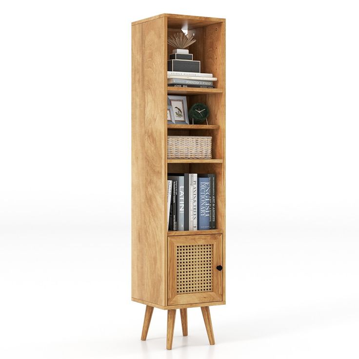 a tall wooden bookcase with books on top and two shelves below it, in front of a white background