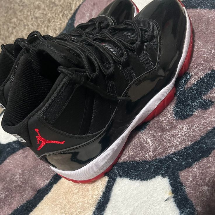 Jordan 11 Bred. Worn A Little. Small Scrape On The Side Of The Shoe. Origional Box Is Crinkled. Other Than That The Shoes Are In Great Condition. Bred 11s, Flight Shoes, Jordans Sneakers Outfit, Jordan 11 Bred, Nike Shoes Women Fashion, Pretty Sneakers, Dream Shoe, Retro Basketball Shoes, Pretty Shoes Sneakers