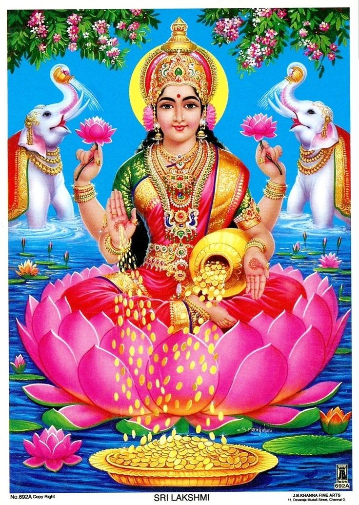 the hindu god sitting on top of a lotus flower