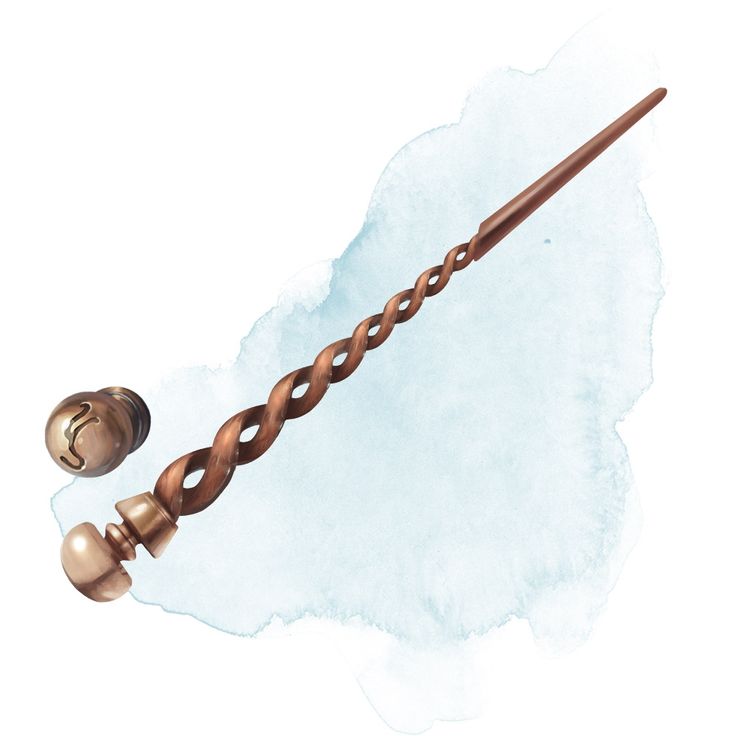 a harry potter's wand with two golden balls on it and a brown handle