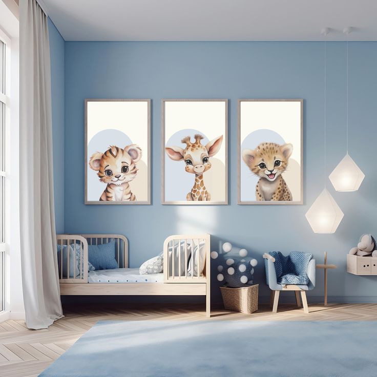 three pictures of baby animals hanging on the wall in a child's room with blue walls