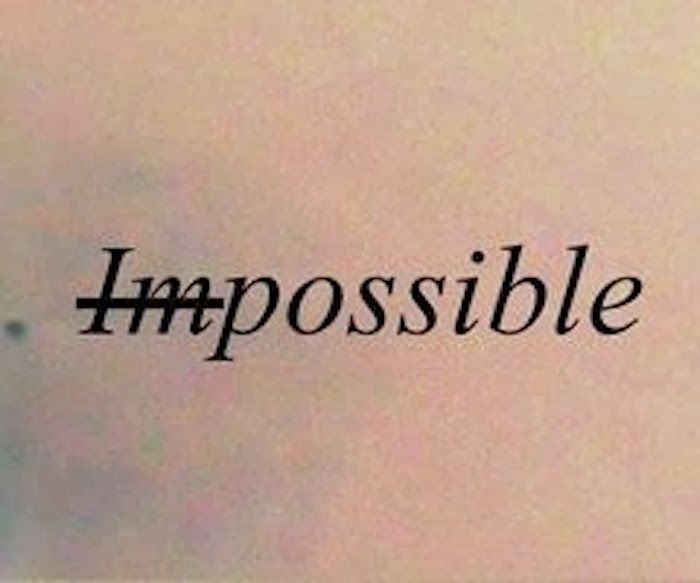 the word impossible written on a piece of paper