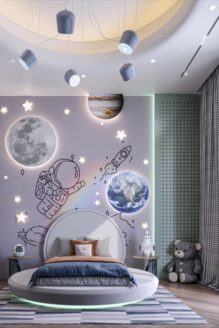 this is a bedroom with a space theme painted on the wall and lights hanging from the ceiling