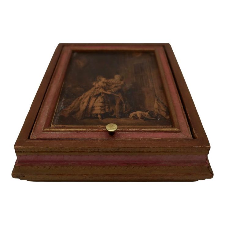 a wooden box with a painting on it