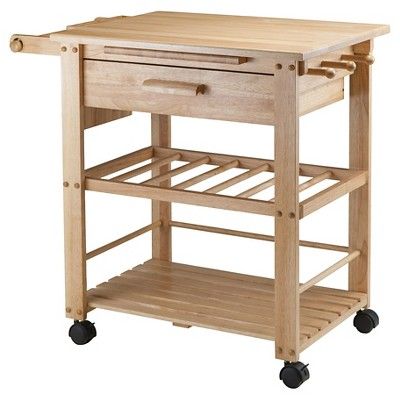 a wooden kitchen cart with drawers on wheels